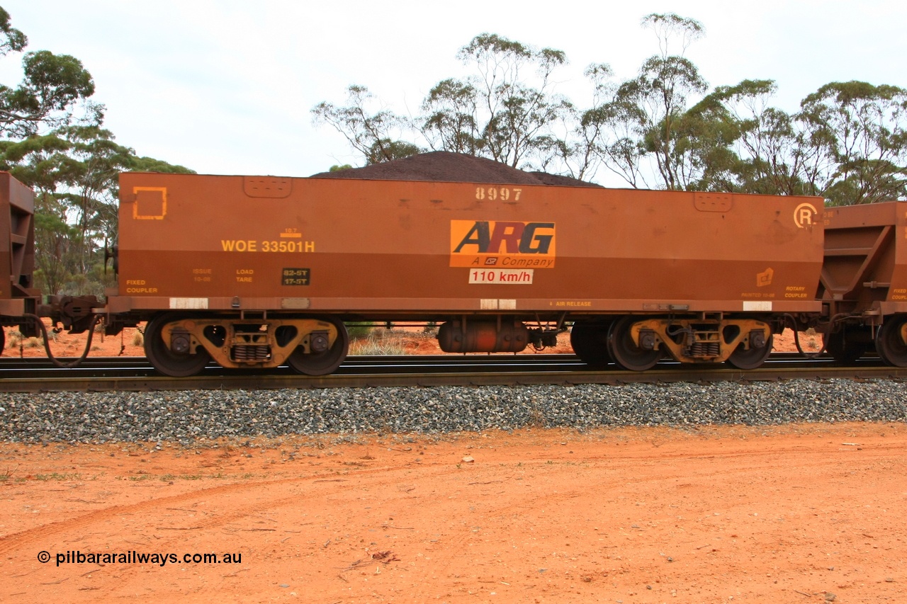100605 9354
WOE type iron ore waggon WOE 33501 is one of a batch of one hundred and twenty eight built by United Group Rail WA between August 2008 and March 2009 with serial number 950211-041 and fleet number 8997 for Koolyanobbing iron ore operations, with ARG decal, build date of 10/2008 and revised load of 82.5 tonnes, seen here Binduli Triangle 5th June 2010.
Keywords: WOE-type;WOE33501;United-Group-Rail-WA;950211-041;
