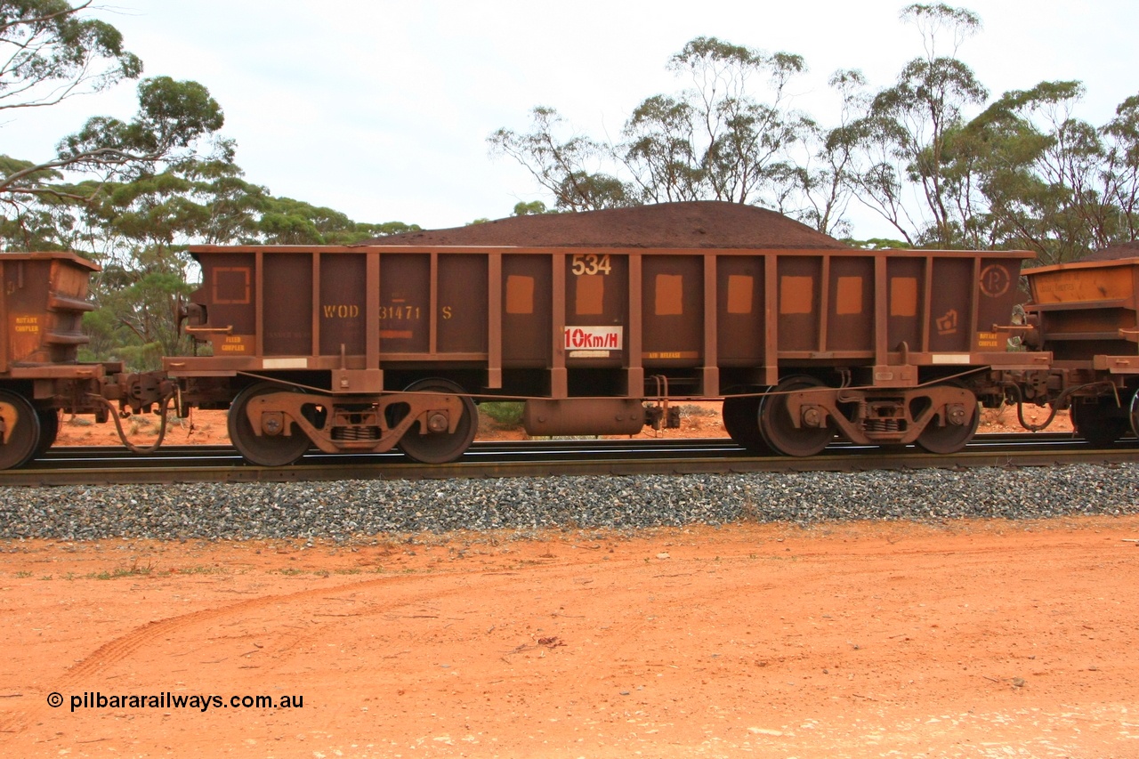 100605 9369
WOD type iron ore waggon WOD 31471 is one of a batch of sixty two built by Goninan WA between April and August 2000 with serial number 950086-043 and fleet number 534 for Koolyanobbing iron ore operations with a 75 ton capacity for Portman Mining to cart their Koolyanobbing iron ore to Esperance, now with PORTMAN painted out, Binduli Triangle, loaded with fines, 5th June 2010.
Keywords: WOD-type;WOD31471;Goninan-WA;950086-043;