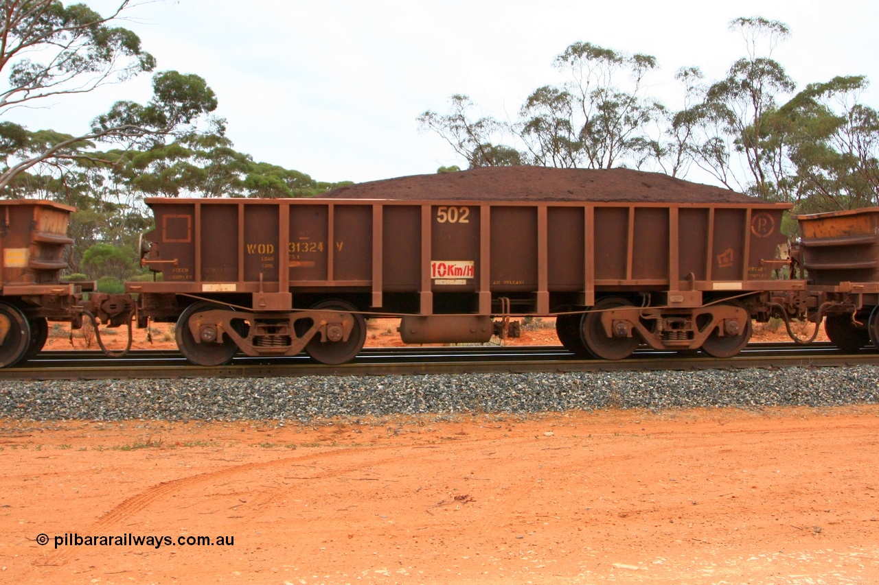100605 9374
WOD type iron ore waggon WOD 31324 is one of a batch of sixty two built by Goninan WA between April and August 2000 with serial number 950086-012 and fleet number 502 for Koolyanobbing iron ore operations with a 75 ton capacity and a replacement for a WO type waggon number, for Portman Mining to cart their Koolyanobbing iron ore to Esperance, Binduli Triangle, loaded with fines, 5th June 2010.
Keywords: WOD-type;WOD31324;Goninan-WA;950086-012;