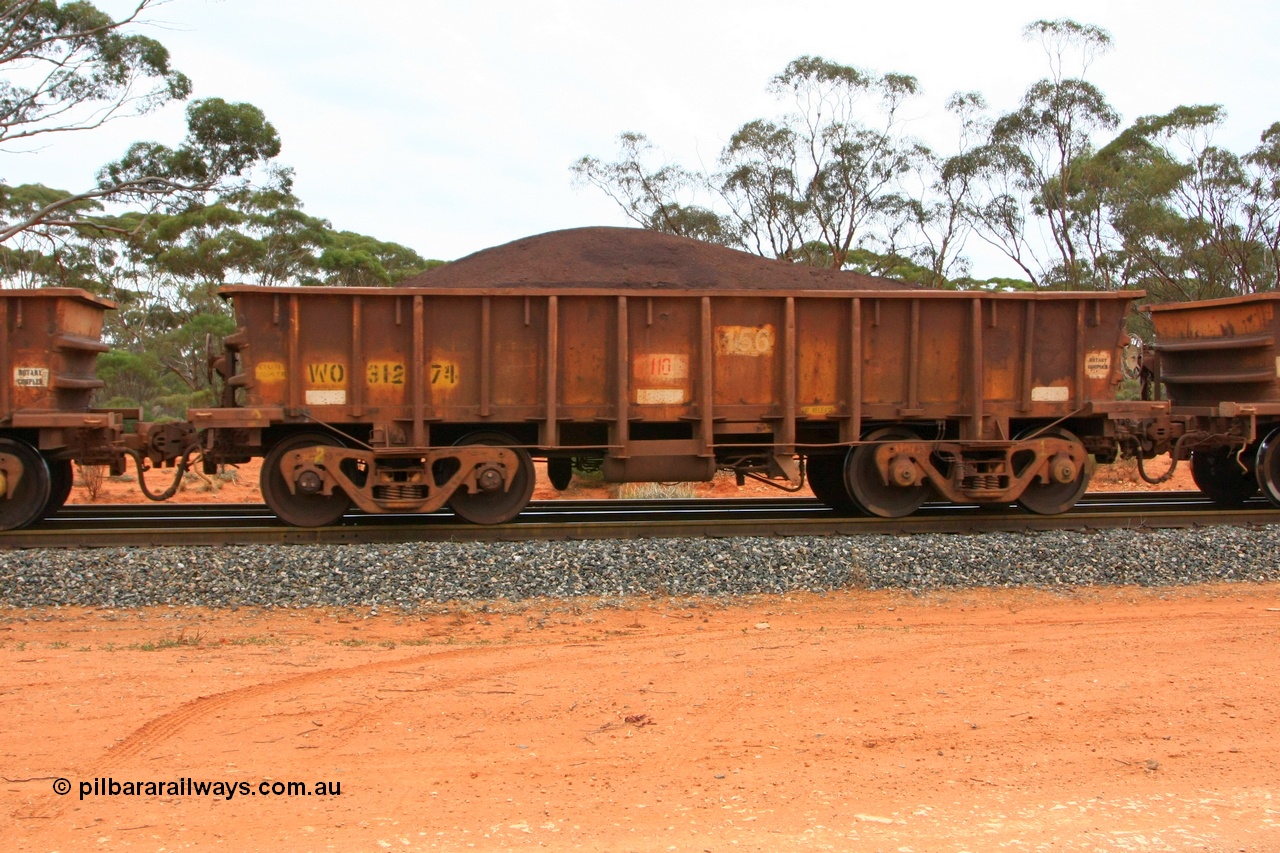 100605 9376
WO type iron ore waggon WO 31274 is one of a batch of eighty six built by WAGR Midland Workshops between 1967 and March 1968 with fleet number 156 for Koolyanobbing iron ore operations, with a 75 ton and 1018 ft³ capacity, Binduli Triangle, loaded with fines, 5th June 2010.
Keywords: WO-type;WO31274;WAGR-Midland-WS;
