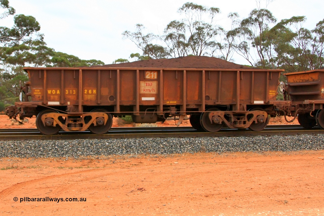 100605 9378
WOA type iron ore waggon WOA 31326 is one of a batch of thirty nine built by WAGR Midland Workshops between 1970 and 1971 with fleet number 211 for Koolyanobbing iron ore operations, with a 75 ton and 1018 ft³ capacity, Binduli Triangle, loaded with fines, 5th June 2010.
Keywords: WOA-type;WOA31326;WAGR-Midland-WS;