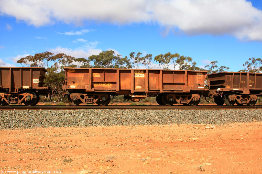 100729 01490
WOB type iron ore waggon WOB 31400 is one of a batch of twenty five built by Comeng WA between 1974 and 1975 and converted from Mt Newman high sided waggons by WAGR Midland Workshops with a capacity of 67 tons with fleet number 324 for Koolyanobbing iron ore operations. This waggon was also converted to a WSM type ballast hopper by re-fitting the cut down top section and having bottom discharge doors fitted, converted back to WOB in 1998, on a loaded train at Binduli, 29th July 2010.
Keywords: WOB-type;WOB31400;Comeng-WA;WSM-type;Mt-Newman-Mining;