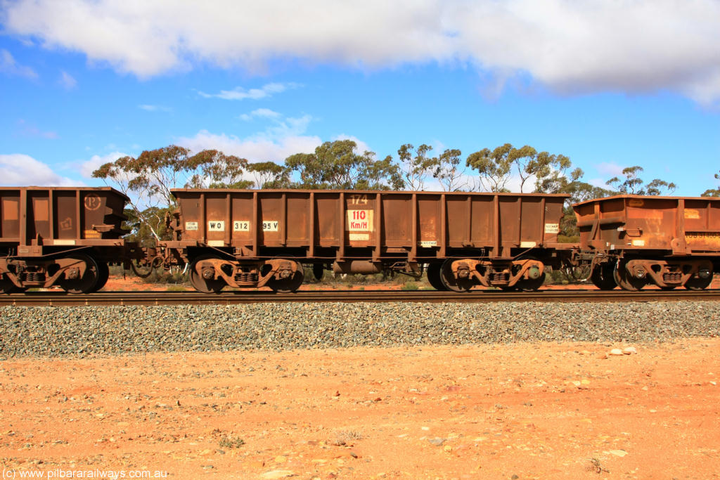 100729 01491
WO type iron ore waggon WO 31295 is one of a batch of fifteen built by WAGR Midland Workshops between July and October 1968 with fleet number 174 for Koolyanobbing iron ore operations, with a 75 ton and 1018 ft³ capacity, Binduli Triangle, empty train 29th July 2010. This unit was converted to WOC for coal in 1986 till 1994 when it was re-classed back to WO.
Keywords: WO-type;WO31295;WAGR-Midland-WS;