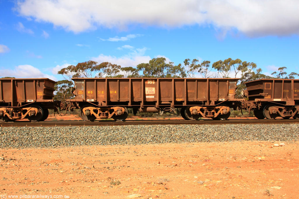 100729 01493
WO type iron ore waggon WO 31281 is one of a batch of eighty six built by WAGR Midland Workshops between 1967 and March 1968 with fleet number 161 for Koolyanobbing iron ore operations, with a 75 ton and 1018 ft³ capacity, Binduli Triangle, empty train 29th July 2010. This unit was converted to WOC for coal in 1986 till 1994 when it was re-classed back to WO.
Keywords: WO-type;WO31281;WAGR-Midland-WS;