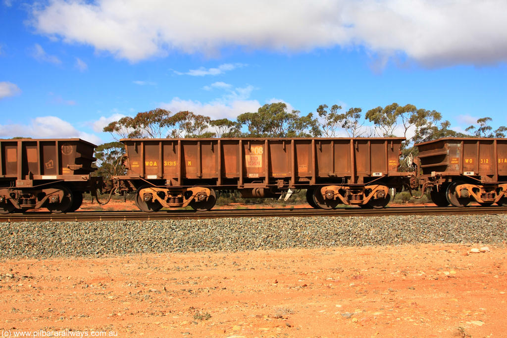 100729 01494
WOA type iron ore waggon WOA 31315 is one of a batch of thirty nine built by WAGR Midland Workshops between 1970 and 1971 with fleet number 208 for Koolyanobbing iron ore operations, with a 75 ton and 1018 ft³ capacity, Binduli Triangle, 29th July 2010.
Keywords: WOA-type;WOA31315;WAGR-Midland-WS;