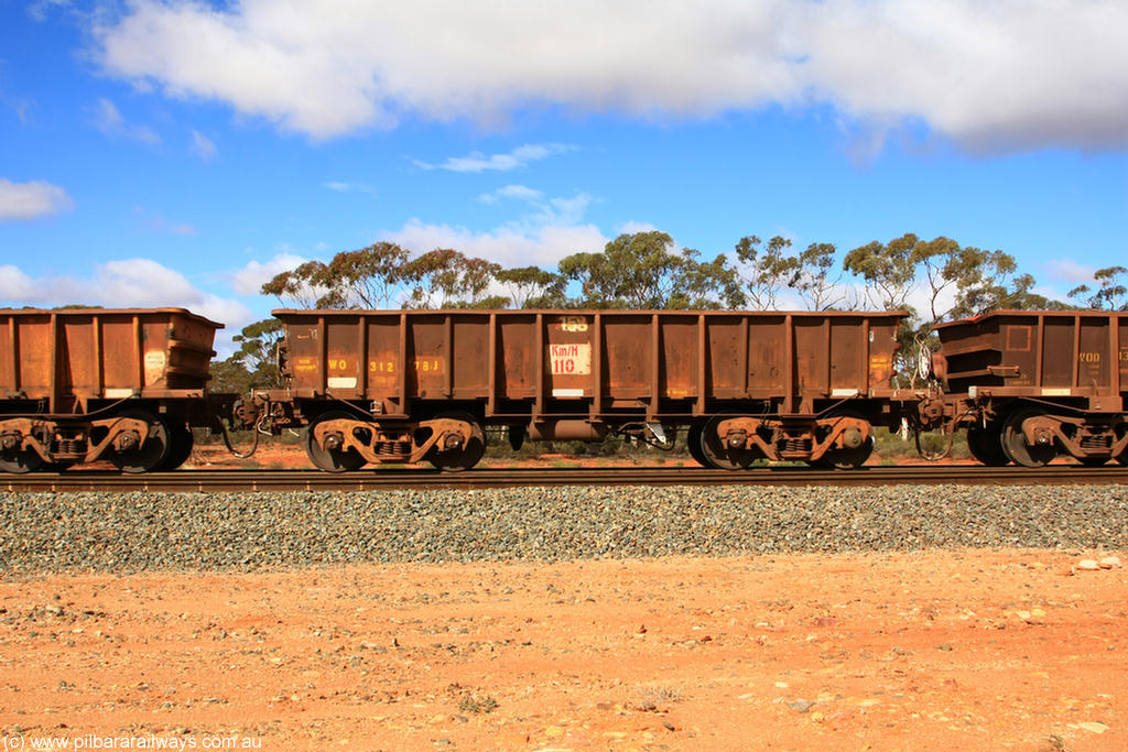 100729 01497
WO type iron ore waggon WO 31278 is one of a batch of eighty six built by WAGR Midland Workshops between 1967 and March 1968 with fleet number 158 for Koolyanobbing iron ore operations, with a 75 ton and 1018 ft³ capacity, Binduli Triangle, 29th July 2010. This unit was converted to WOC for coal in 1986 till 1994 when it was re-classed back to WO.
Keywords: WO-type;WO31278;WAGR-Midland-WS;