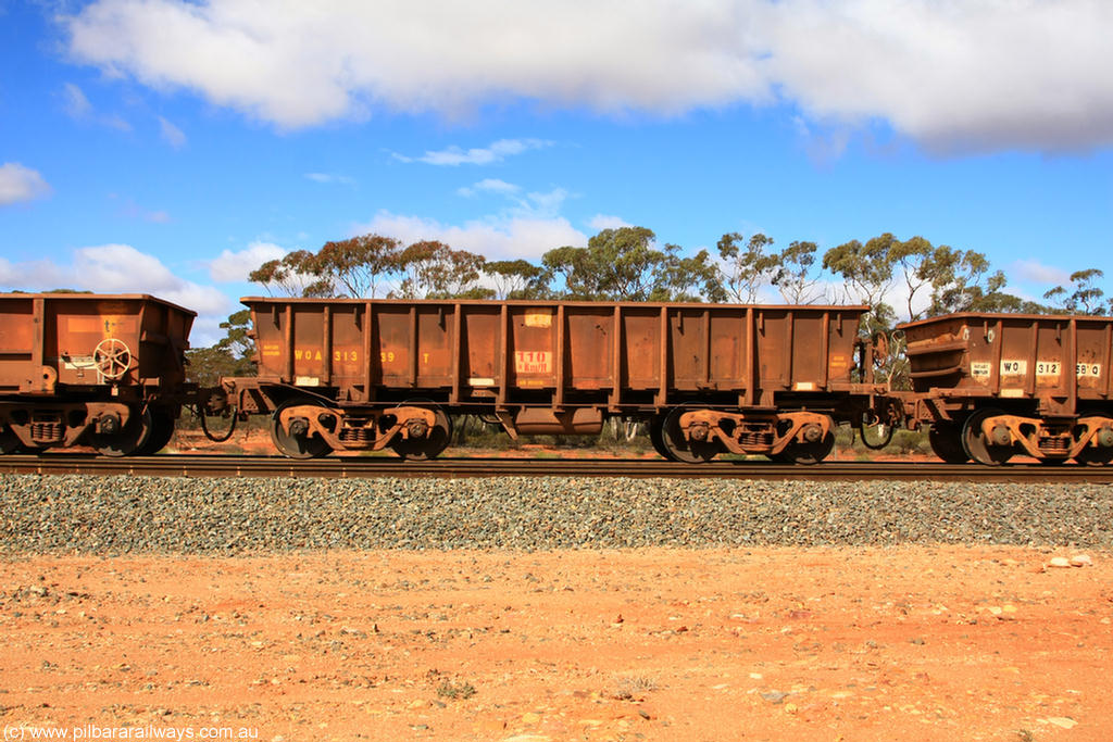 100729 01503
WOA type iron ore waggon WOA 31339 is one of a batch of thirty nine built by WAGR Midland Workshops between 1970 and 1971 with fleet number 217 for Koolyanobbing iron ore operations, with a 75 ton and 1018 ft³ capacity, at Binduli Triangle, 29th July 2010.
Keywords: WOA-type;WOA31339;WAGR-Midland-WS;