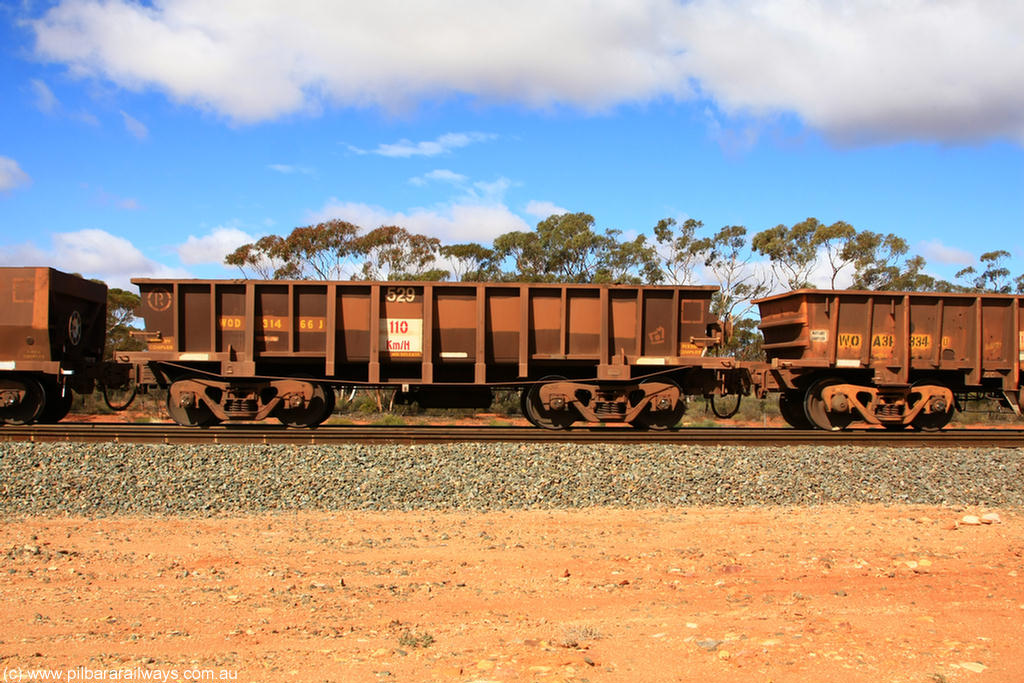 100729 01509
WOD type iron ore waggon WOD 31466 is one of a batch of sixty two built by Goninan WA between April and August 2000 with serial number 950086-038 and fleet number 529 for Koolyanobbing iron ore operations with a 75 ton capacity for Portman Mining to cart their Koolyanobbing iron ore to Esperance, now with PORTMAN painted out, Binduli Triangle, 29th July 2010.
Keywords: WOD-type;WOD31466;Goninan-WA;950086-038;