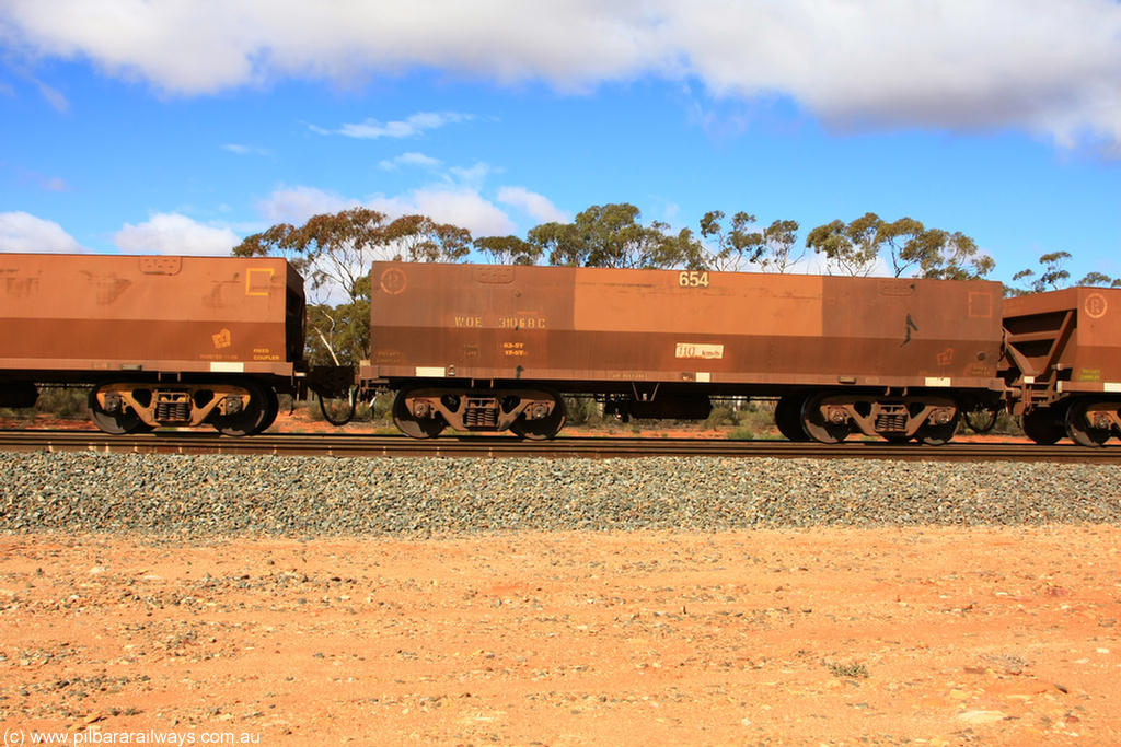 100729 01511
WOE type iron ore waggon WOE 31068 is one of a batch of one hundred and thirty built by Goninan WA between March and August 2001 with serial number 950092-058 and fleet number 654 for Koolyanobbing iron ore operations, at Binduli Triangle, 29th July 2010.
Keywords: WOE-type;WOE31068;Goninan-WA;950092-058;