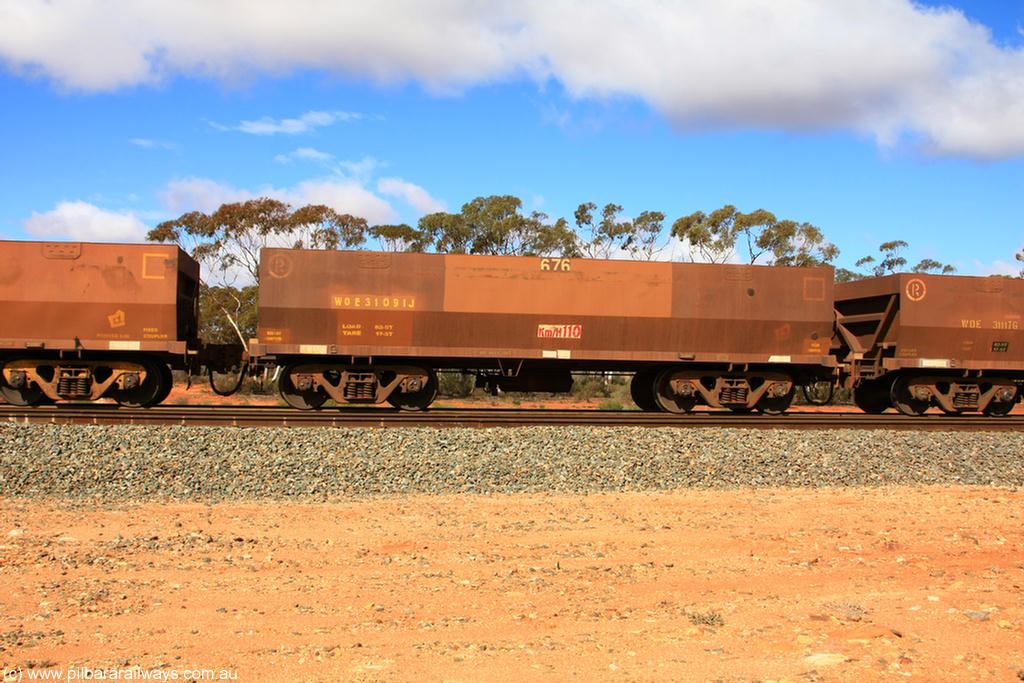 100729 01517
WOE type iron ore waggon WOE 31091 is one of a batch of one hundred and thirty built by Goninan WA between March and August 2001 with serial number 950092-081 and fleet number 676 for Koolyanobbing iron ore operations, at Binduli Triangle, 29th July 2010.
Keywords: WOE-type;WOE31091;Goninan-WA;950092-081;