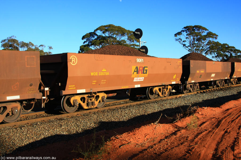100731 02274
WOE type iron ore waggon WOE 33575 is one of a batch of one hundred and twenty eight built by United Group Rail WA between August 2008 and March 2009 with serial number 950211-115 and fleet number 9061 for Koolyanobbing iron ore operations, on loaded train 6413 at Binduli Triangle, 31st July 2010.
Keywords: WOE-type;WOE33575;United-Group-Rail-WA;950211-115;