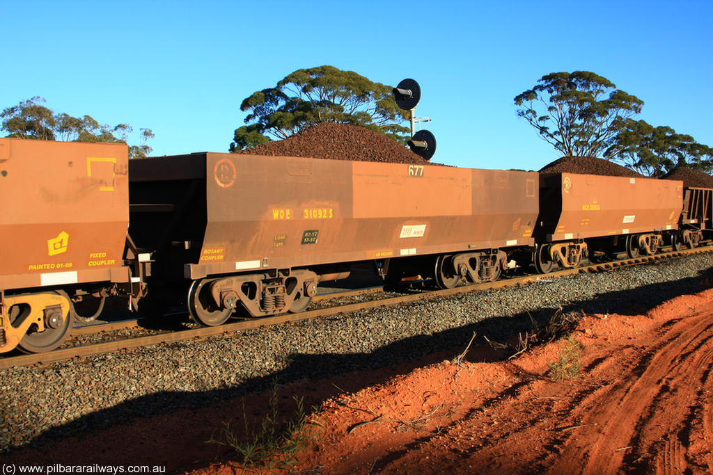 100731 02275
WOE type iron ore waggon WOE 31092 is one of a batch of one hundred and thirty built by Goninan WA between March and August 2001 with serial number 950092-082 and fleet number 677 for Koolyanobbing iron ore operations, on loaded train 6413 at Binduli Triangle, 31st July 2010.
Keywords: WOE-type;WOE31092;Goninan-WA;950092-082;