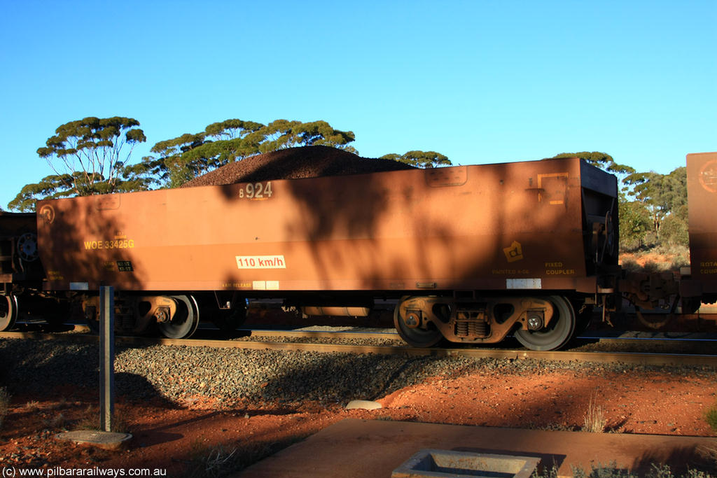 100731 02280
WOE type iron ore waggon WOE 33425 is one of a batch of one hundred and forty one built by United Group Rail WA between November 2005 and April 2006 with serial number 950142-130 and fleet number 8924 for Koolyanobbing iron ore operations, on loaded train 6413 at Binduli Triangle, 31st July 2010.
Keywords: WOE-type;WOE33425;United-Group-Rail-WA;950142-130;