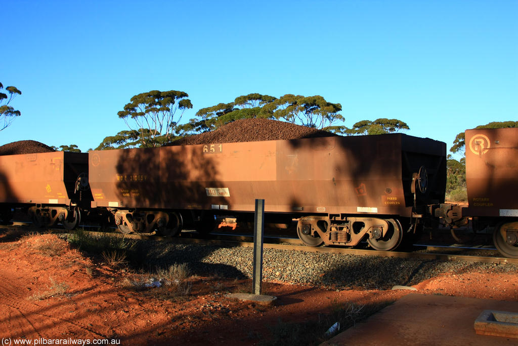 100731 02281
WOE type iron ore waggon WOE 31065 is one of a batch of one hundred and thirty built by Goninan WA between March and August 2001 with serial number 950092-055 and fleet number 651 for Koolyanobbing iron ore operations, on loaded train 6413 at Binduli Triangle, 31st July 2010.
Keywords: WOE-type;WOE31065;Goninan-WA;950092-055;