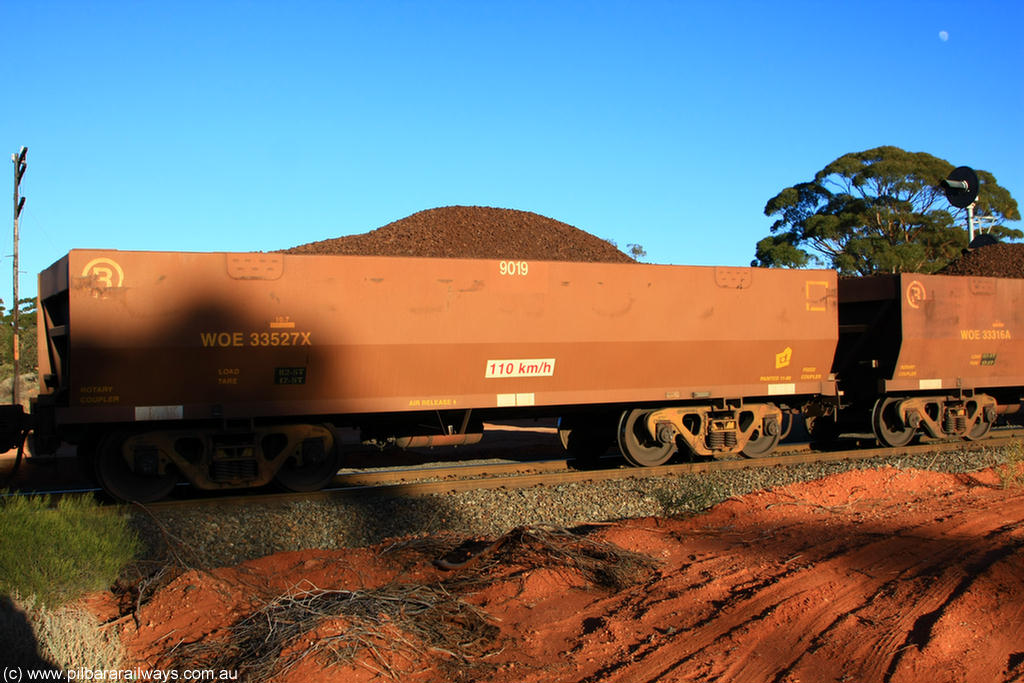 100731 02284
WOE type iron ore waggon WOE 33527 is one of a batch of one hundred and twenty eight built by United Group Rail WA between August 2008 and March 2009 with serial number 950211-067 and fleet number 9019 for Koolyanobbing iron ore operations, on loaded train 6413 at Binduli Triangle, 31st July 2010.
Keywords: WOE-type;WOE33527;United-Group-Rail-WA;950211-067;