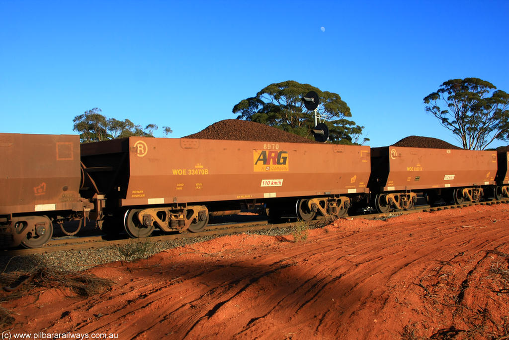 100731 02287
WOE type iron ore waggon WOE 33470 is one of a batch of one hundred and twenty eight built by United Group Rail WA between August 2008 and March 2009 with serial number 950211-012 and fleet number 8970 for Koolyanobbing iron ore operations, the 8 being a addition due to fleet size, build date of 06/2006 with a revised load of 82.5 tonnes, with PORTMAN painted out and an ARG decal applied to the side, on loaded train 6413 at Binduli Triangle, 31st July 2010.
Keywords: WOE-type;WOE33470;United-Group-Rail-WA;950211-012;