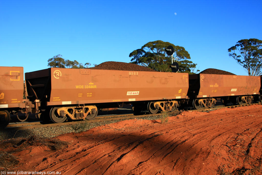 100731 02292
WOE type iron ore waggon WOE 33486 is one of a batch of one hundred and twenty eight built by United Group Rail WA between August 2008 and March 2009 with serial number 950211-??? and fleet number 8987 for Koolyanobbing iron ore operations, on loaded train 6413 at Binduli Triangle, 31st July 2010.
Keywords: WOE-type;WOE33486;United-Group-Rail-WA;