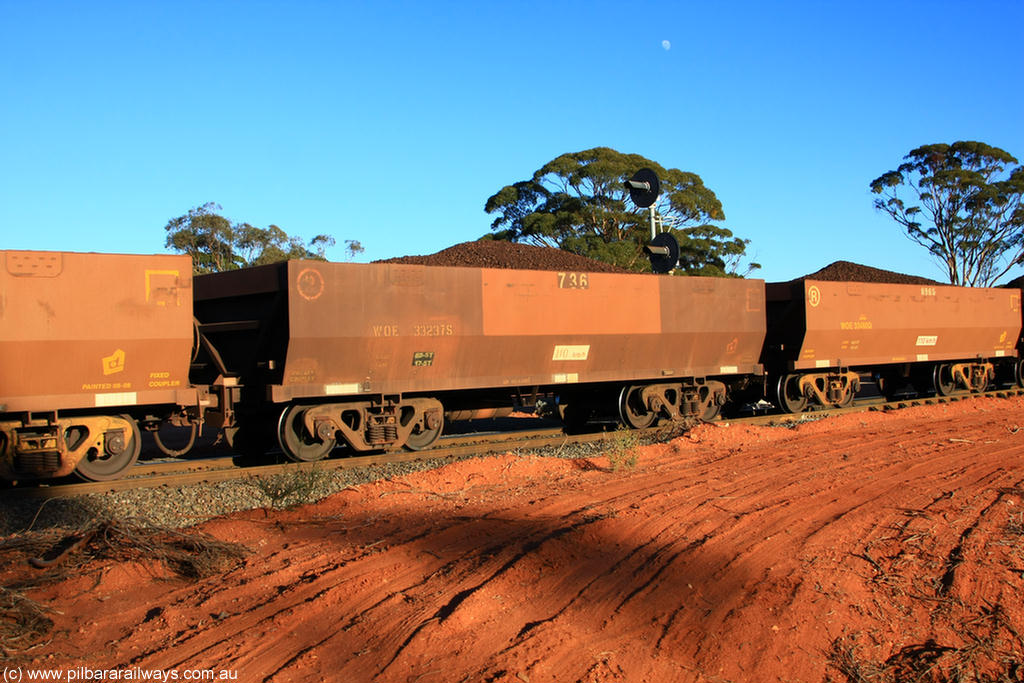100731 02295
WOE type iron ore waggon WOE 33237 is one of a batch of twenty seven built by Goninan WA between September and October 2002 with serial number and fleet number 736 for Koolyanobbing iron ore operations, on loaded train 6413 at Binduli Triangle, 31st July 2010.
Keywords: WOE-type;WOE33237;Goninan-WA;950103-004;