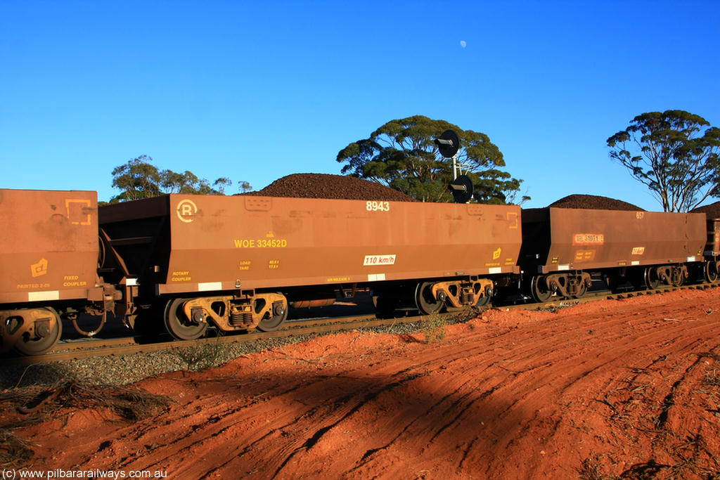 100731 02298
WOE type iron ore waggon WOE 33452 is one of a batch of seventeen built by United Group Rail WA between July and August 2008 with serial number 950209-016 and fleet number 8943 for Koolyanobbing iron ore operations, on loaded train 6413 at Binduli Triangle, 31st July 2010.
Keywords: WOE-type;WOE33452;United-Group-Rail-WA;950209-016;