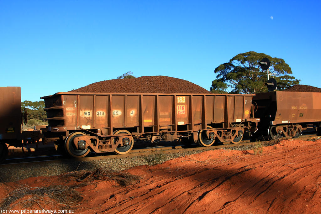 100731 02300
WO type iron ore waggon WO 31405 is one of a batch of eleven replacement waggons built by WAGR Midland Workshops between 1970 and 1971 with fleet number 183 for Koolyanobbing iron ore operations, with a 75 ton and 1018 ft³ capacity, with new wheel sets, on loaded train 6413 at Binduli Triangle, 31st July 2010.
Keywords: WO-type;WO31405;WAGR-Midland-WS;