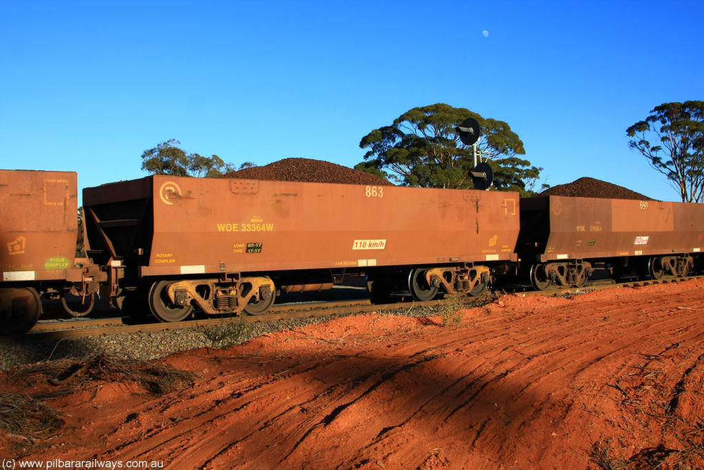 100731 02303
WOE type iron ore waggon WOE 33364 is one of a batch of one hundred and forty one built by United Goninan WA between November 2005 and April 2006 with serial number 950142-069 and fleet number 863 for Koolyanobbing iron ore operations, on loaded train 6413 at Binduli Triangle, 31st July 2010.
Keywords: WOE-type;WOE33364;United-Goninan-WA;950142-069;