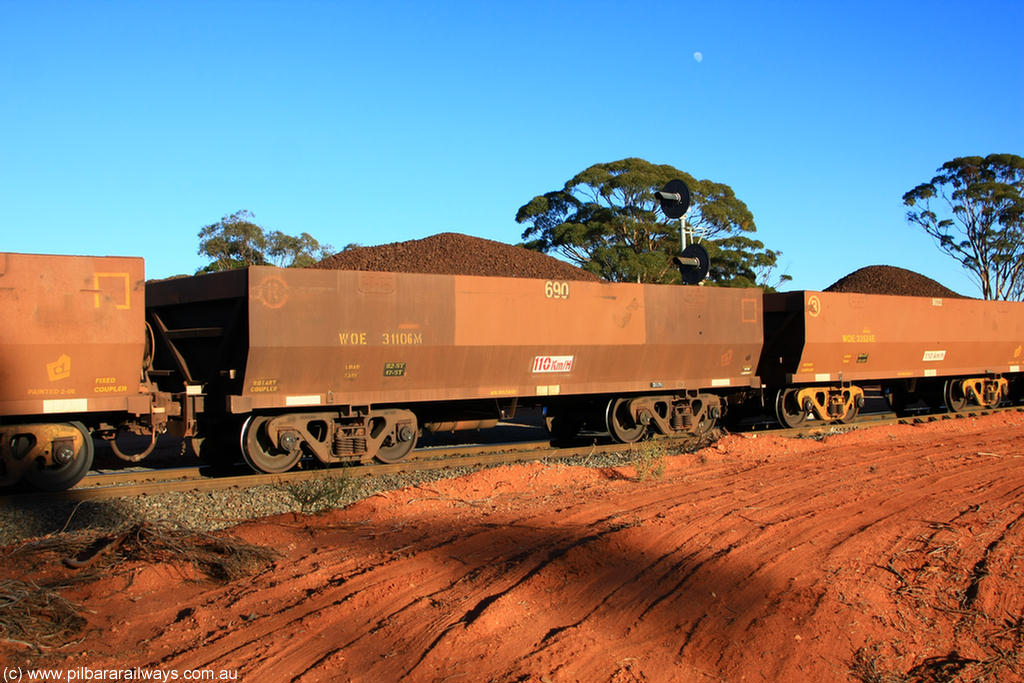 100731 02304
WOE type iron ore waggon WOE 31106 is one of a batch of one hundred and thirty built by Goninan WA between March and August 2001 with serial number 950092-096 and fleet number 690 for Koolyanobbing iron ore operations, on loaded train 6413 at Binduli Triangle, 31st July 2010.
Keywords: WOE-type;WOE31106;Goninan-WA;950092-096;