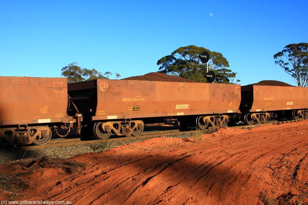 100731 02311
WOE type iron ore waggon WOE 33323 is one of a batch of one hundred and forty one built by United Goninan WA between November 2005 and April 2006 with serial number 950142-028 and fleet number 822 for Koolyanobbing iron ore operations, on loaded train 6413 at Binduli Triangle, 31st July 2010.
Keywords: WOE-type;WOE33323;United-Goninan-WA;950142-028;