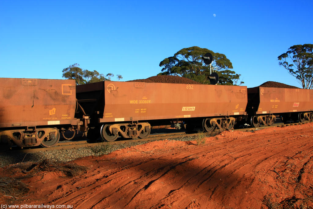 100731 02312
WOE type iron ore waggon WOE 33393 is one of a batch of one hundred and forty one built by United Group Rail WA between November 2005 and April 2006 with serial number 950142-098 and fleet number 892 for Koolyanobbing iron ore operations, on loaded train 6413 at Binduli Triangle, 31st July 2010.
Keywords: WOE-type;WOE33393;United-Group-Rail-WA;950142-098;
