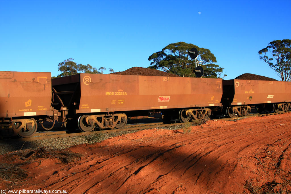 100731 02313
WOE type iron ore waggon WOE 33355 is one of a batch of one hundred and forty one built by United Goninan WA between November 2005 and April 2006 with serial number 950142-060 and fleet number 854 for Koolyanobbing iron ore operations, on loaded train 6413 at Binduli Triangle, 31st July 2010.
Keywords: WOE-type;WOE33355;United-Goninan-WA;950142-060;