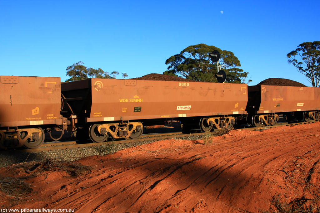 100731 02317
WOE type iron ore waggon WOE 33494 is one of a batch of one hundred and twenty eight built by United Group Rail WA between August 2008 and March 2009 with serial number 950211-034 and fleet number 9000 for Koolyanobbing iron ore operations, on loaded train 6413 at Binduli Triangle, 31st July 2010.
Keywords: WOE-type;WOE33494;United-Group-Rail-WA;950211-034;