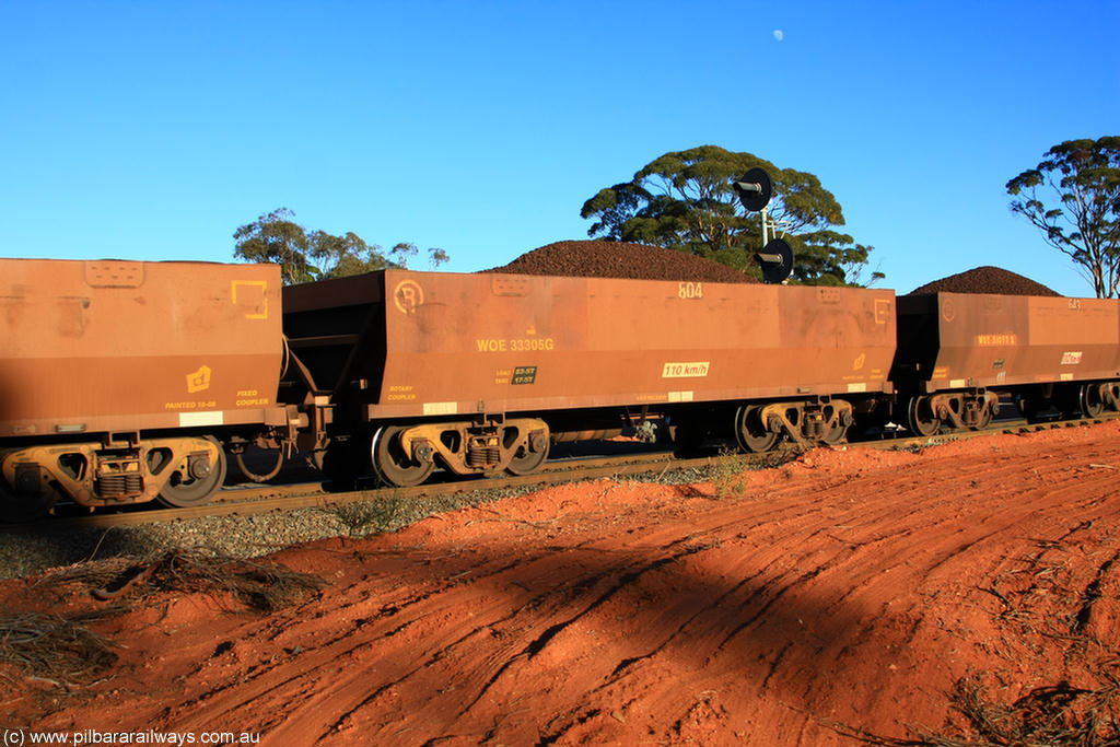 100731 02318
WOE type iron ore waggon WOE 33305 is one of a batch of one hundred and forty one built by United Goninan WA between November 2005 and April 2006 with serial number 950142-010 and fleet number 804 for Koolyanobbing iron ore operations, on loaded train 6413 at Binduli Triangle, 31st July 2010.
Keywords: WOE-type;WOE33305;United-Goninan-WA;950142-010;