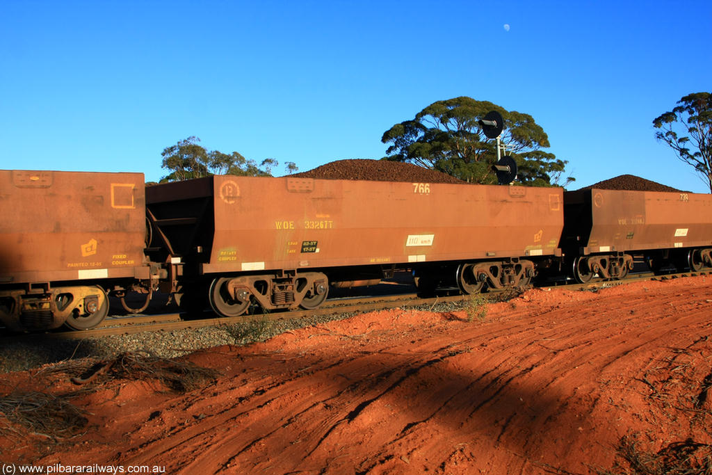 100731 02333
WOE type iron ore waggon WOE 33267 is one of a batch of thirty five built by Goninan WA between January and April 2005 with serial number 950104-007 and fleet number 766 for Koolyanobbing iron ore operations, on loaded train 6413 at Binduli Triangle, 31st July 2010.
Keywords: WOE-type;WOE33267;Goninan-WA;950104-007;