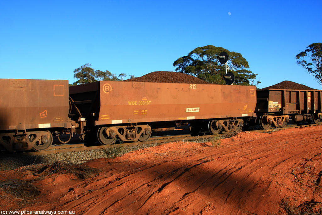 100731 02335
WOE type iron ore waggon WOE 33313 is one of a batch of one hundred and forty one built by United Goninan WA between November 2005 and April 2006 with serial number 950142-018 and fleet number 812 for Koolyanobbing iron ore operations, on loaded train 6413 at Binduli Triangle, 31st July 2010.
Keywords: WOE-type;WOE33313;United-Goninan-WA;950142-018;