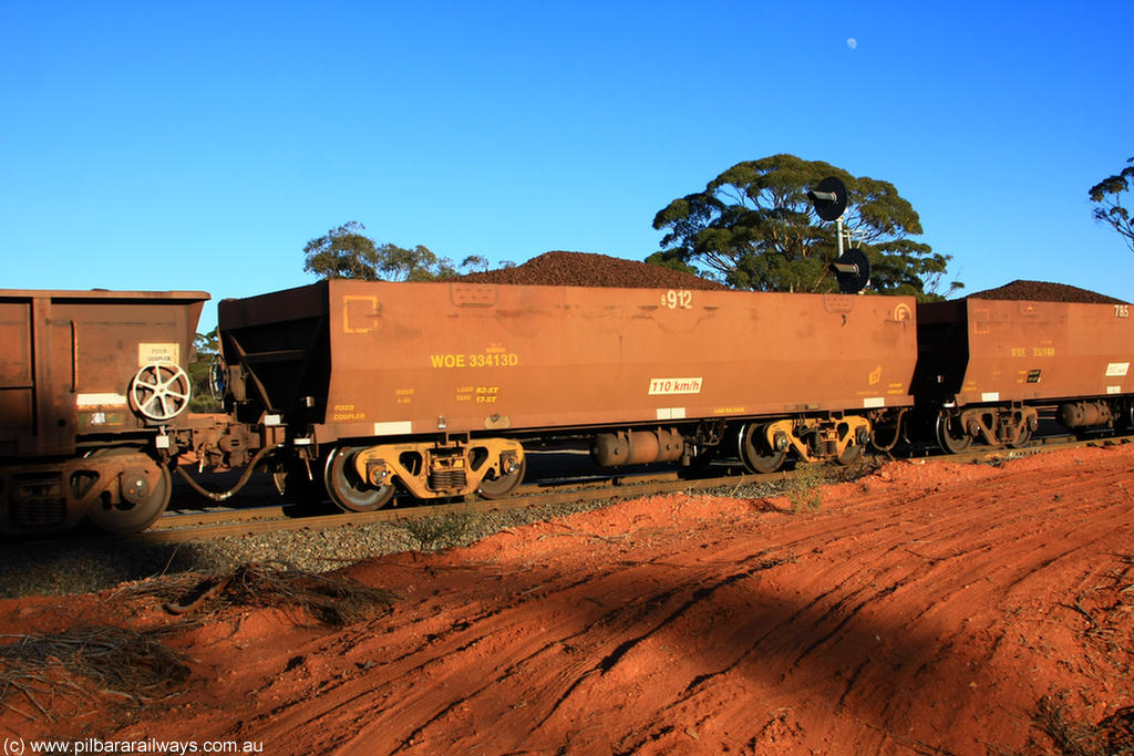100731 02337
WOE type iron ore waggon WOE 33413 is one of a batch of one hundred and forty one built by United Group Rail WA between November 2005 and April 2006 with serial number 950142-118 and fleet number 8912 for Koolyanobbing iron ore operations, on loaded train 6413 at Binduli Triangle, 31st July 2010.
Keywords: WOE-type;WOE33413;United-Group-Rail-WA;950142-118;