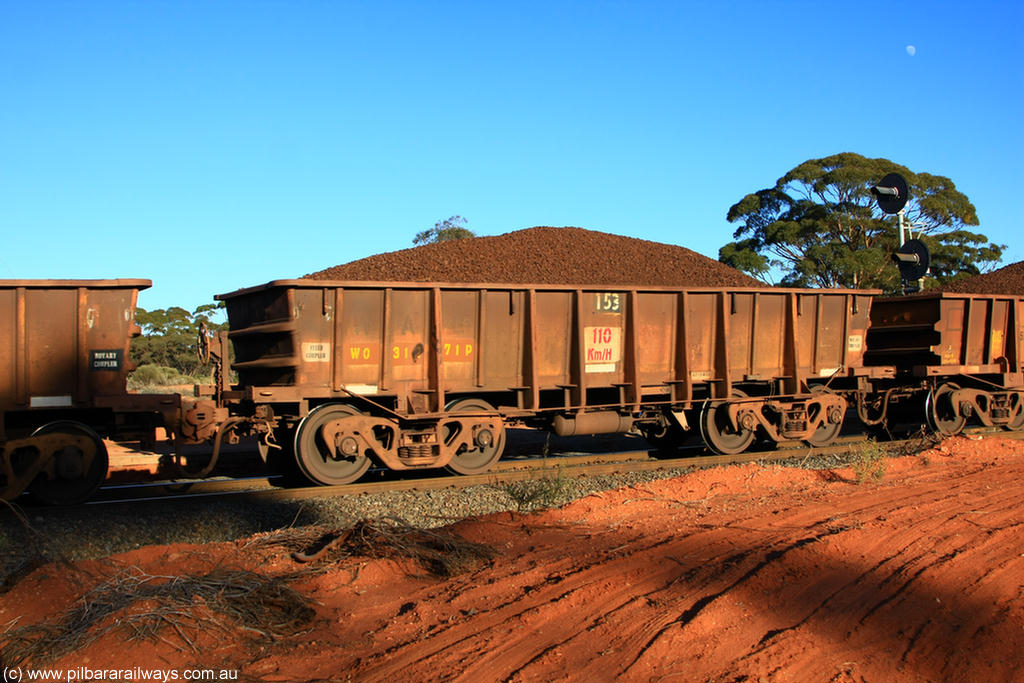 100731 02348
WO type iron ore waggon WO 31271 is one of a batch of eighty six built by WAGR Midland Workshops between 1967 and March 1968 with fleet number 153 for Koolyanobbing iron ore operations, with a 75 ton and 1018 ft³ capacity, on loaded train 6413 at Binduli Triangle, 31st July 2010. This unit was converted to WOS superphosphate in the late 1980s till 1994 when it was re-classed back to WO.
Keywords: WO-type;WO31271;WAGR-Midland-WS;WOS-type;