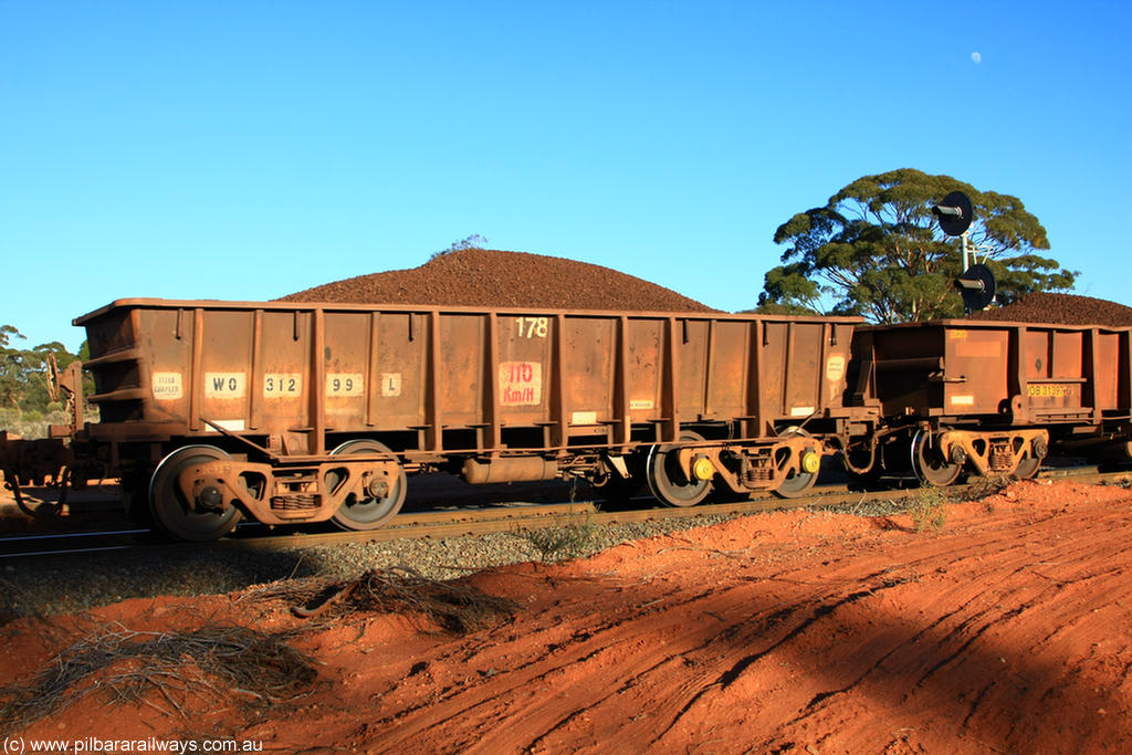 100731 02355
WO type iron ore waggon WO 31299 is one of a batch of fifteen built by WAGR Midland Workshops between July and October 1968 with fleet number 178 for Koolyanobbing iron ore operations, with a 75 ton and 1018 ft³ capacity, on loaded train 6413 at Binduli Triangle, 31st July 2010. This unit was converted to WOS superphosphate in the late 1980s till 1994 when it was re-classed back to WO.
Keywords: WO-type;WO31299;WAGR-Midland-WS;WOS-type;