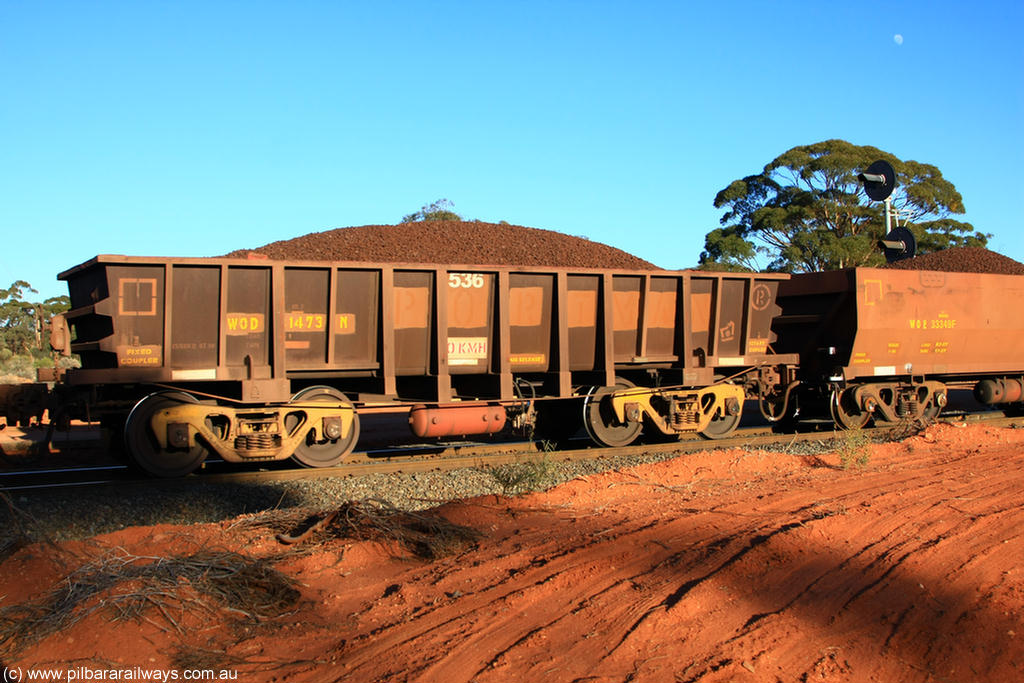 100731 02363
WOD type iron ore waggon WOD 31473 is one of a batch of sixty two built by Goninan WA between April and August 2000 with serial number 950086-045 and fleet number 536 for Koolyanobbing iron ore operations with a 75 ton capacity for Portman Mining to cart their Koolyanobbing iron ore to Esperance, now with PORTMAN painted out, on loaded train 6413 at Binduli Triangle, 31st July 2010.
Keywords: WOD-type;WOD31473;Goninan-WA;950086-045;