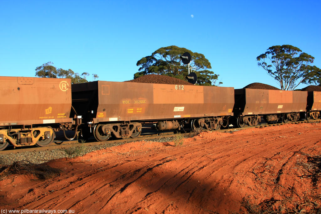 100731 02370
WOE type iron ore waggon WOE 30268 is one of a batch of one hundred and thirty built by Goninan WA between March and August 2001 with serial number 950092-018 and fleet number 612 for Koolyanobbing iron ore operations, on loaded train 6413 at Binduli Triangle, 31st July 2010.
Keywords: WOE-type;WOE30268;Goninan-WA;950092-018;