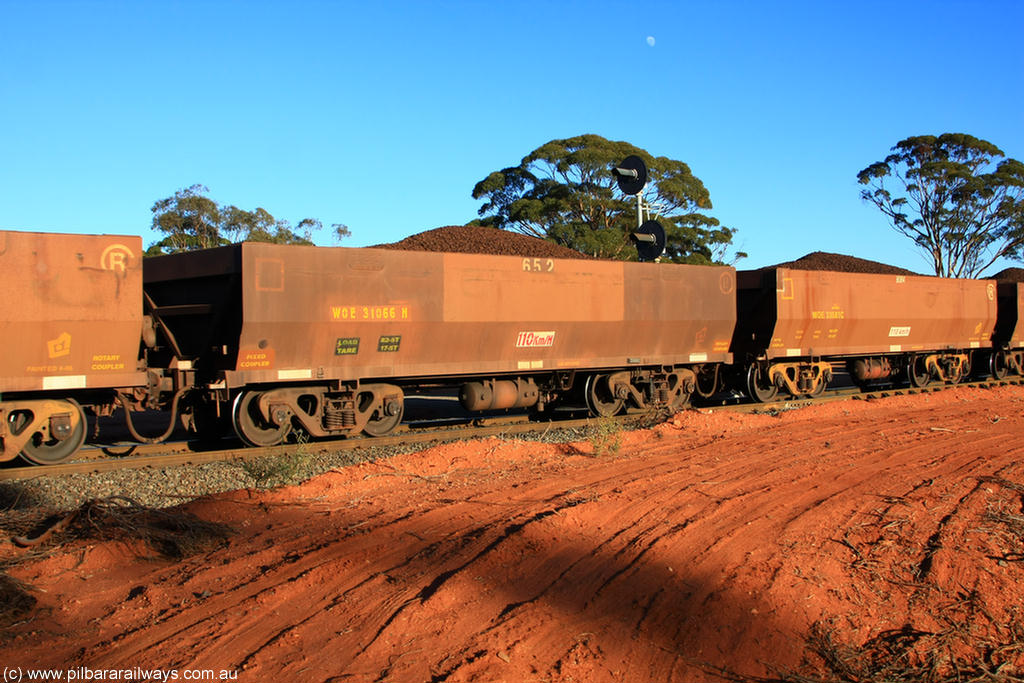 100731 02378
WOE type iron ore waggon WOE 31066 is one of a batch of one hundred and thirty built by Goninan WA between March and August 2001 with serial number 950092-056 and fleet number 652 for Koolyanobbing iron ore operations, on loaded train 6413 at Binduli Triangle, 31st July 2010.
Keywords: WOE-type;WOE31066;Goninan-WA;950092-056;