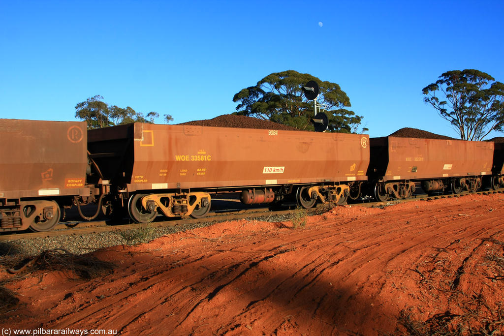 100731 02379
WOE type iron ore waggon WOE 33581 is one of a batch of one hundred and twenty eight built by United Group Rail WA between August 2008 and March 2009 with serial number 950211-121 and fleet number 9084 for Koolyanobbing iron ore operations, on loaded train 6413 at Binduli Triangle, 31st July 2010.
Keywords: WOE-type;WOE33581;United-Group-Rail-WA;950211-121;