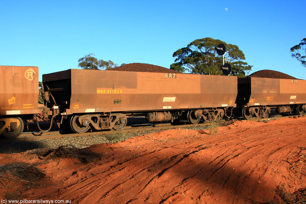 100731 02388
WOE type iron ore waggon WOE 31103 is one of a batch of one hundred and thirty built by Goninan WA between March and August 2001 with serial number 950092-093 and fleet number 687 for Koolyanobbing iron ore operations, on loaded train 6413 at Binduli Triangle, 31st July 2010.
Keywords: WOE-type;WOE31103;Goninan-WA;950092-093;