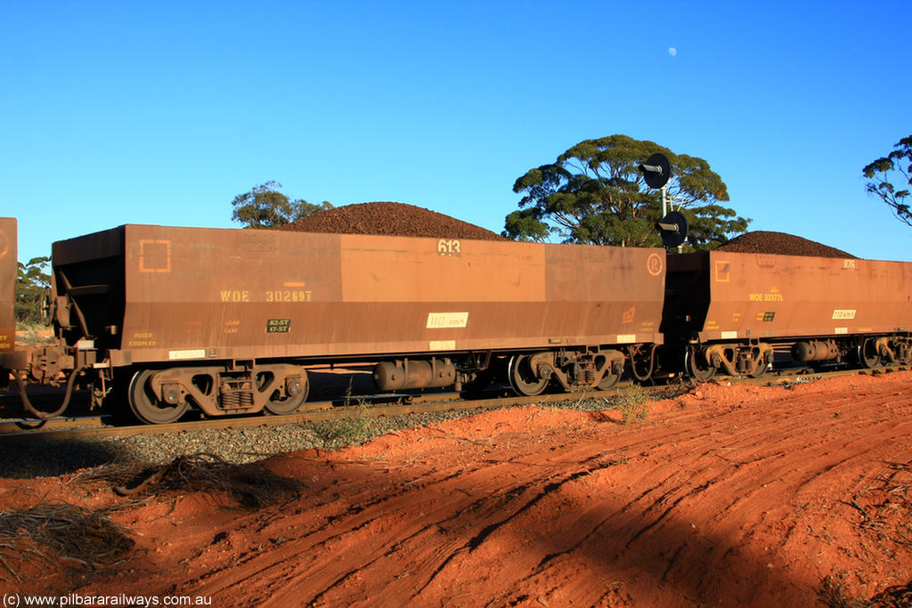 100731 02393
WOE type iron ore waggon WOE 30269 is one of a batch of one hundred and thirty built by Goninan WA between March and August 2001 with serial number 950092-019 and fleet number 613 for Koolyanobbing iron ore operations, on loaded train 6413 at Binduli Triangle, 31st July 2010.
Keywords: WOE-type;WOE30269;Goninan-WA;950092-019;