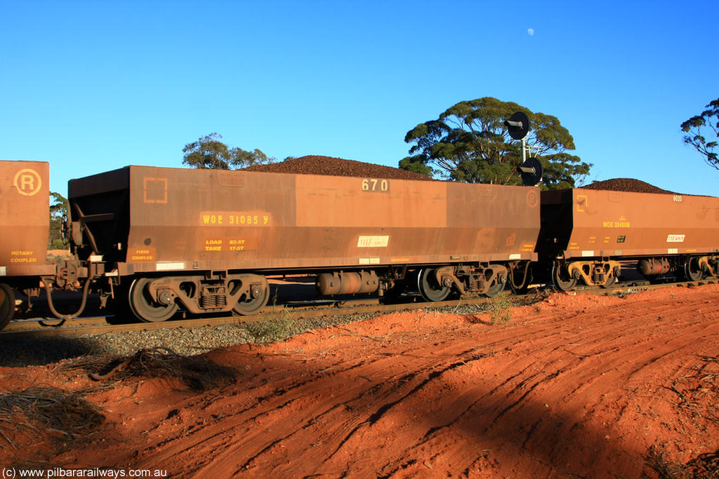 100731 02396
WOE type iron ore waggon WOE 31085 is one of a batch of one hundred and thirty built by Goninan WA between March and August 2001 with serial number 950092-075 and fleet number 670 for Koolyanobbing iron ore operations, on loaded train 6413 at Binduli Triangle, 31st July 2010.
Keywords: WOE-type;WOE31085;Goninan-WA;950092-075;