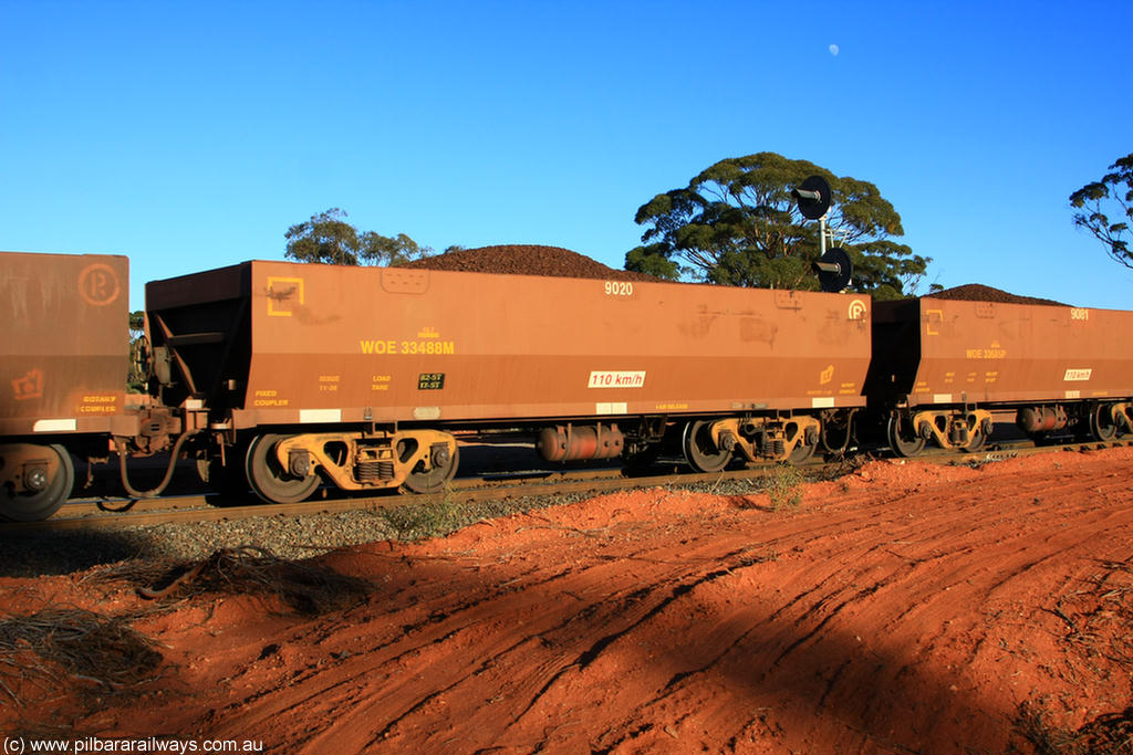 100731 02397
WOE type iron ore waggon WOE 33488 is one of a batch of one hundred and twenty eight built by United Group Rail WA between August 2008 and March 2009 with serial number 950211-028 and fleet number 9020 for Koolyanobbing iron ore operations, on loaded train 6413 at Binduli Triangle, 31st July 2010.
Keywords: WOE-type;WOE33488;United-Group-Rail-WA;950211-028;