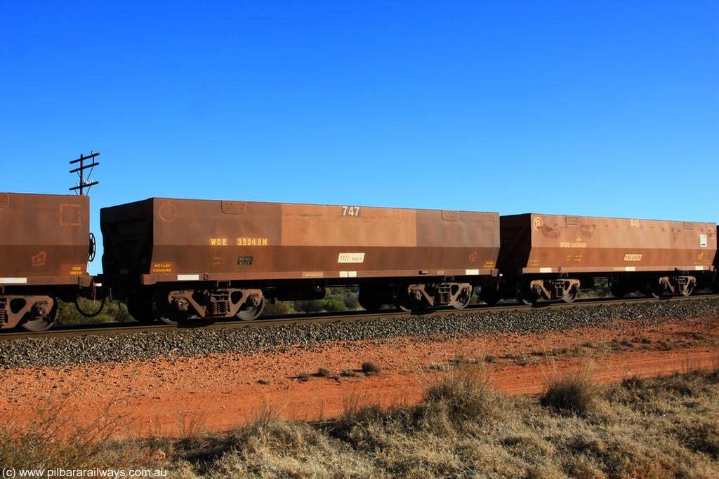 100731 02419
WOE type iron ore waggon WOE 33248 is one of a batch of twenty seven built by Goninan WA between September and October 2002 with serial number 950103-015 and fleet number 747 for Koolyanobbing iron ore operations, on empty train 6418 at Binduli Triangle, 31st July 2010.
Keywords: WOE-type;WOE33248;Goninan-WA;950103-015;