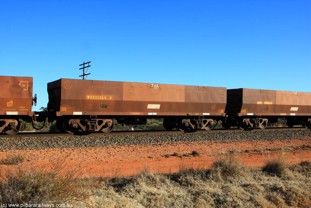 100731 02420
WOE type iron ore waggon WOE 33247 is one of a batch of twenty seven built by Goninan WA between September and October 2002 with serial number 950103-014 and fleet number 746 for Koolyanobbing iron ore operations, on empty train 6418 at Binduli Triangle, 31st July 2010.
Keywords: WOE-type;WOE33247;Goninan-WA;950103-014;