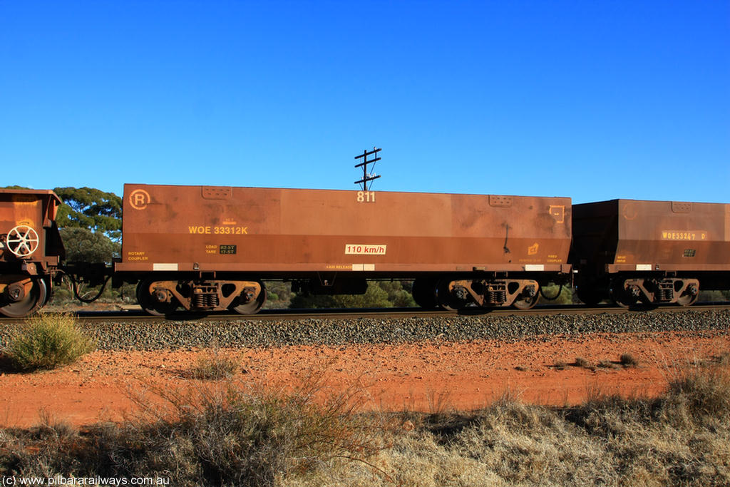 100731 02421
WOE type iron ore waggon WOE 33312 is one of a batch of one hundred and forty one built by United Goninan WA between November 2005 and April 2006 with serial number 950142-017 and fleet number 811 for Koolyanobbing iron ore operations, on empty train 6418 at Binduli Triangle, 31st July 2010.
Keywords: WOE-type;WOE33312;United-Goninan-WA;950142-017;