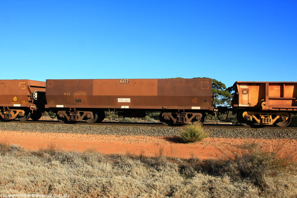 100731 02427
WOE type iron ore waggon WOE 30257 is one of a batch of one hundred and thirty built by Goninan WA between March and August 2001 with serial number 950092-007 and fleet number 607 for Koolyanobbing iron ore operations, on empty train 6418 at Binduli Triangle, 31st July 2010.
Keywords: WOE-type;WOE30257;Goninan-WA;950092-007;