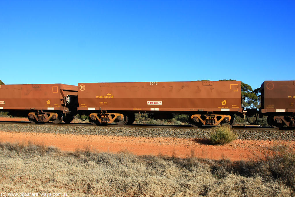 100731 02428
WOE type iron ore waggon WOE 33554 is one of a batch of one hundred and twenty eight built by United Group Rail WA between August 2008 and March 2009 with serial number 950211-094 and fleet number 9046 for Koolyanobbing iron ore operations, on empty train 6418 at Binduli Triangle, 31st July 2010.
Keywords: WOE-type;WOE33554;United-Group-Rail-WA;950211-094;