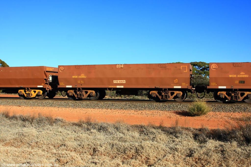100731 02430
WOE type iron ore waggon WOE 33395 is one of a batch of one hundred and forty one built by United Group Rail WA between November 2005 and April 2006 with serial number 950142-100 and fleet number 894 for Koolyanobbing iron ore operations, on empty train 6418 at Binduli Triangle, 31st July 2010.
Keywords: WOE-type;WOE33395;United-Group-Rail-WA;950142-100;
